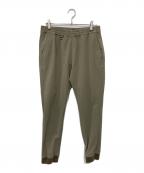 uniform experimentユニフォームエクスペリメント）の古着「ナイロンパンツ」｜ブラウン