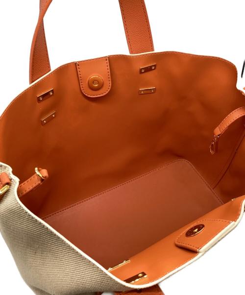 CHARLES & KEITH（チャールズアンドキース）CHARLES & KEITH (チャールズアンドキース) ダブルハンドル ホーボーバッグ アイボリー×オレンジの古着・服飾アイテム