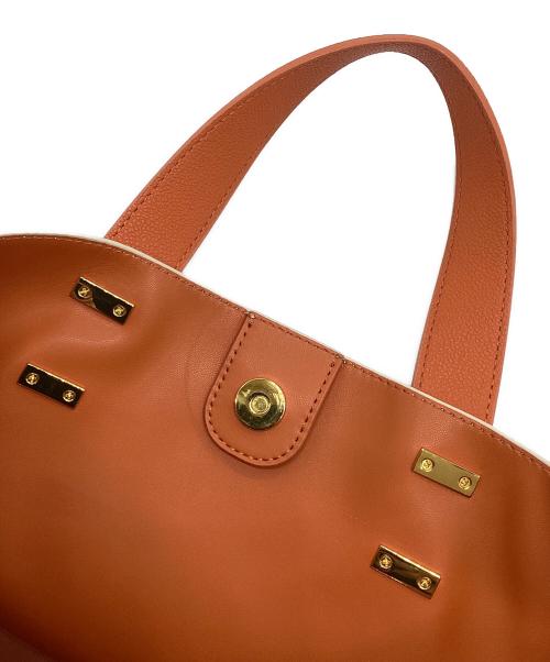CHARLES & KEITH（チャールズアンドキース）CHARLES & KEITH (チャールズアンドキース) ダブルハンドル ホーボーバッグ アイボリー×オレンジの古着・服飾アイテム