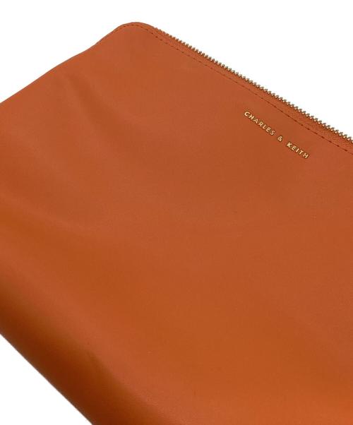 CHARLES & KEITH（チャールズアンドキース）CHARLES & KEITH (チャールズアンドキース) ダブルハンドル ホーボーバッグ アイボリー×オレンジの古着・服飾アイテム