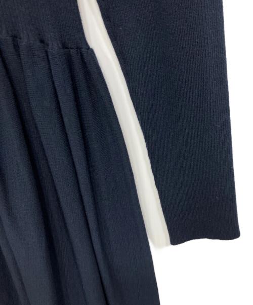 Curensology（カレンソロジー）Curensology (カレンソロジー) ボタンアキギャザーニットワンピース ネイビー サイズ:Freeの古着・服飾アイテム