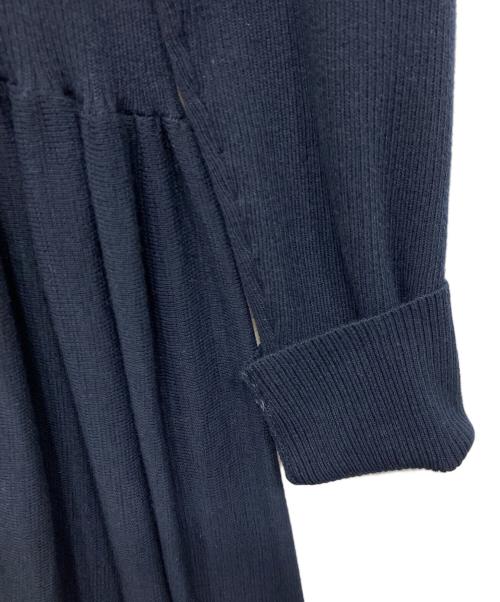 Curensology（カレンソロジー）Curensology (カレンソロジー) ボタンアキギャザーニットワンピース ネイビー サイズ:Freeの古着・服飾アイテム