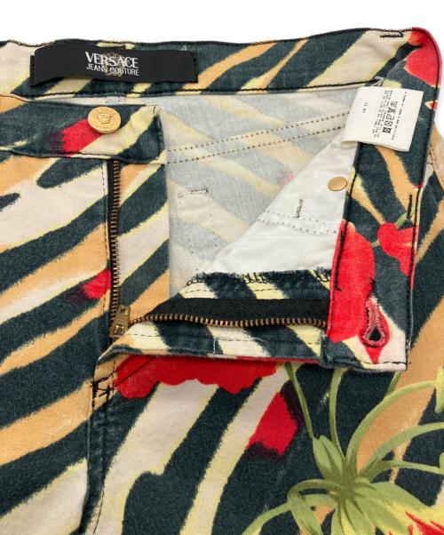 VERSACE JEANS COUTURE（ヴェルサーチ ジーンズクチュール）VERSACE JEANS COUTURE (ヴェルサーチ ジーンズクチュール) アニマルカモフラージュパンツ レッド サイズ:29-43の古着・服飾アイテム
