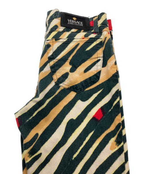 VERSACE JEANS COUTURE（ヴェルサーチ ジーンズクチュール）VERSACE JEANS COUTURE (ヴェルサーチ ジーンズクチュール) アニマルカモフラージュパンツ レッド サイズ:29-43の古着・服飾アイテム