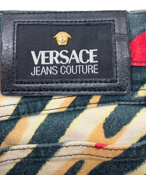 VERSACE JEANS COUTURE（ヴェルサーチ ジーンズクチュール）VERSACE JEANS COUTURE (ヴェルサーチ ジーンズクチュール) アニマルカモフラージュパンツ レッド サイズ:29-43の古着・服飾アイテム