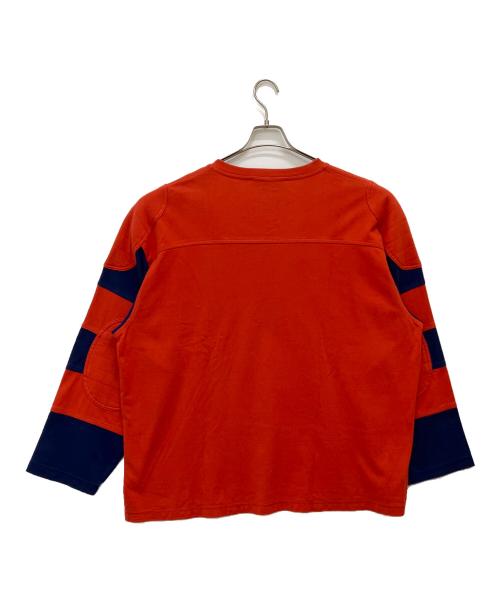 the J Peterman Company（ザ・ジェーピーターマンカンパニー）The J Peterman Company (ザ・ジェーピーターマンカンパニー) フットボールTシャツ オレンジ サイズ:XXLの古着・服飾アイテム