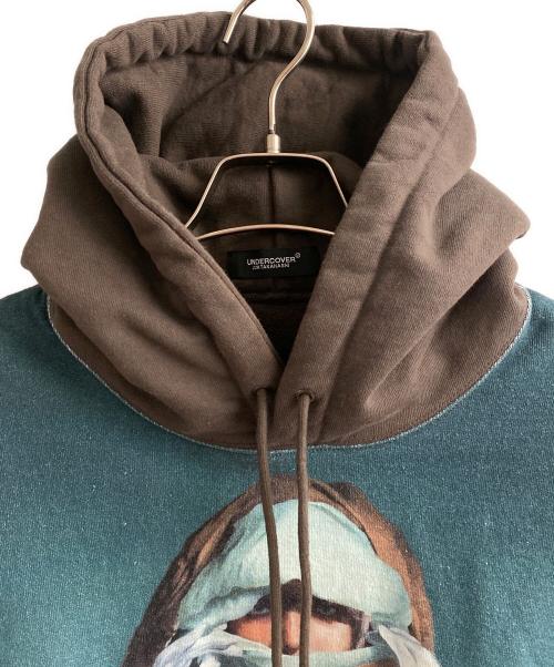 UNDERCOVER（アンダーカバー）UNDERCOVER (アンダーカバー) Markus Akesson (マーカス アーケッソン)) The Mask / 度詰キモウウラケHoodie ブラウン×ブルー サイズ:3の古着・服飾アイテム