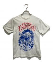 stussy（ステューシー）の古着「アニバーサリープリントTシャツ」｜ホワイト
