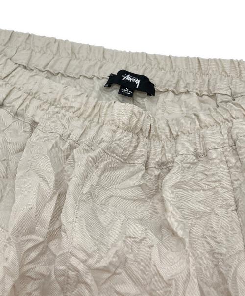 stussy（ステューシー）stussy (ステューシー) RALPHIE BIG CRINKLE PANT アイボリー サイズ:SIZE Lの古着・服飾アイテム