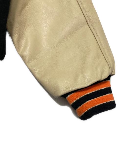 A BATHING APE（ア ベイシング エイプ）A BATHING APE (ア ベイシング エイプ) POST O'ALLS (ポストオーバーオールズ) 90'S レザーアームメルトンスタジャン ブラック×ベージュ サイズ:Lの古着・服飾アイテム