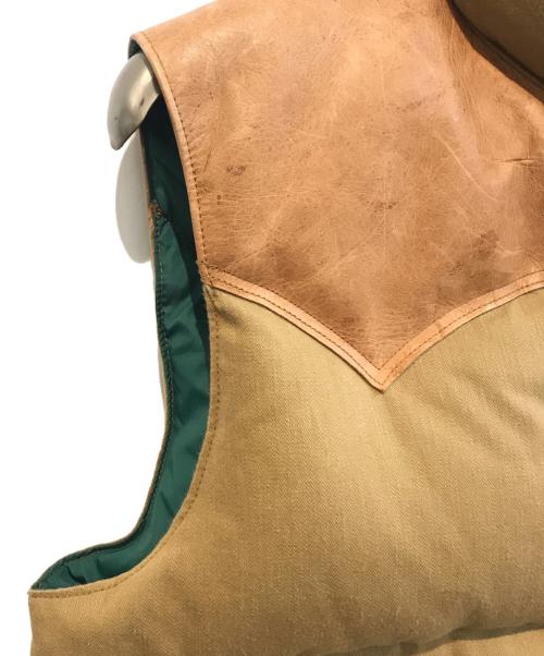 RockyMountainFeatherBed（ロッキーマウンテンフェザーベッド）RockyMountainFeatherBed (ロッキーマウンテンフェザーベッド) WAREHOUSE (ウエアハウス) ドビーツイル ダウンベスト　290-232-53 ブラウン サイズ:40の古着・服飾アイテム