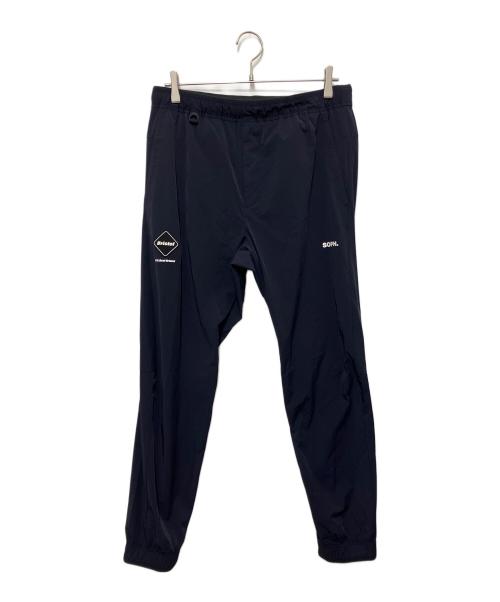 F.C.R.B.（エフシーレアルブリストル）F.C.R.B. (エフシーレアルブリストル) 4WAY STRETCH TRACK PANTS ネイビー サイズ:Lの古着・服飾アイテム