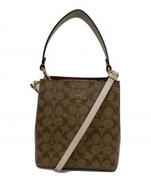 COACH（コーチ）の古着「スモール タウン バケット バッグ」｜ブラウン