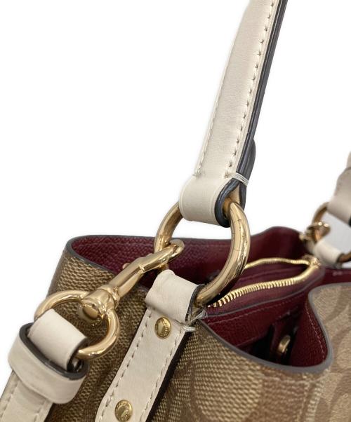 COACH（コーチ）COACH (コーチ) スモール タウン バケット バッグ ブラウンの古着・服飾アイテム