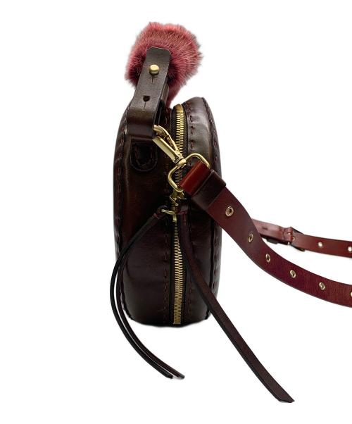 HENRY BEGUELIN（エンリーベグリン）HENRY BEGUELIN (エンリーベグリン) レザーラウンドバッグ　HENRY BEGUELIN レッド×ブラウンの古着・服飾アイテム