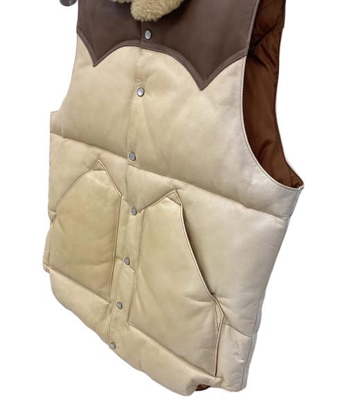 RockyMountainFeatherBed（ロッキーマウンテンフェザーベッド）RockyMountainFeatherBed (ロッキーマウンテンフェザーベッド) オールレザー ダウンベスト ベージュ×ブラウン サイズ:36の古着・服飾アイテム