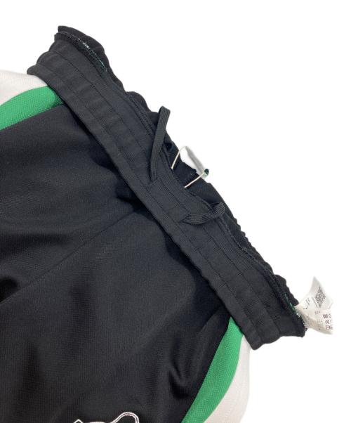 X-LARGE（エクストララージ）X-LARGE (エクストララージ) PUMA (プーマ) トラックパンツ ブラック×グリーン サイズ:L 未使用品の古着・服飾アイテム