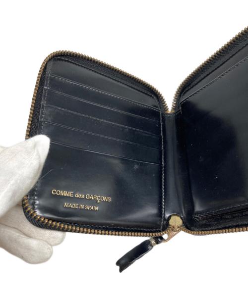 COMME des GARCONS（コムデギャルソン）COMME des GARCONS (コムデギャルソン) ラウンドファスナー財布 ブラックの古着・服飾アイテム