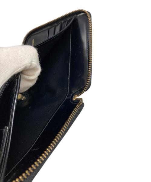 COMME des GARCONS（コムデギャルソン）COMME des GARCONS (コムデギャルソン) ラウンドファスナー財布 ブラックの古着・服飾アイテム