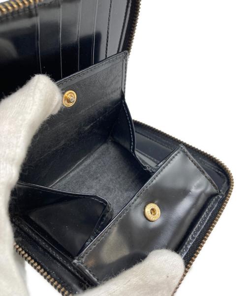 COMME des GARCONS（コムデギャルソン）COMME des GARCONS (コムデギャルソン) ラウンドファスナー財布 ブラックの古着・服飾アイテム