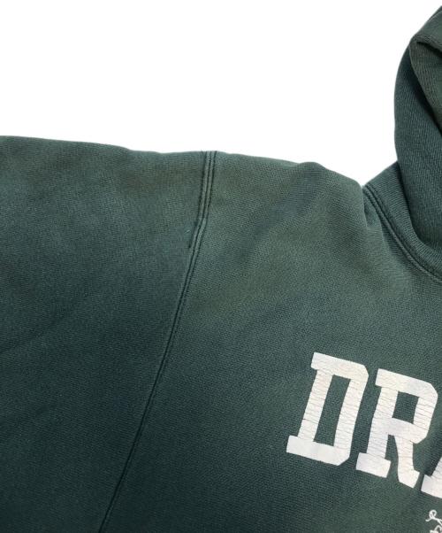 Champion（チャンピオン）Champion (チャンピオン) マスコット3段プリント プルオーバーパーカー グリーン サイズ:X‐LARGEの古着・服飾アイテム