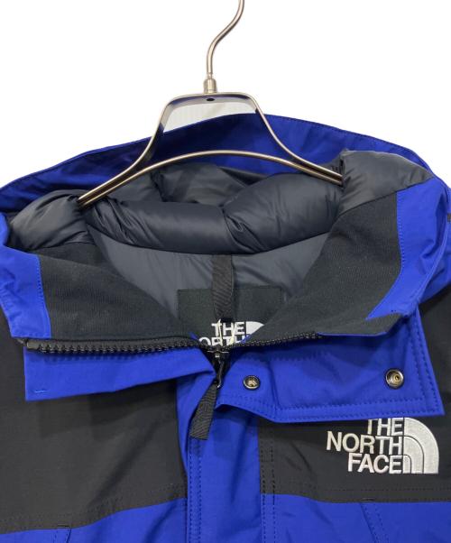 THE NORTH FACE（ザ ノース フェイス）THE NORTH FACE (ザ ノース フェイス) マウンテンダウンジャケット ブルー×ブラック サイズ:SIZE　M 未使用品の古着・服飾アイテム