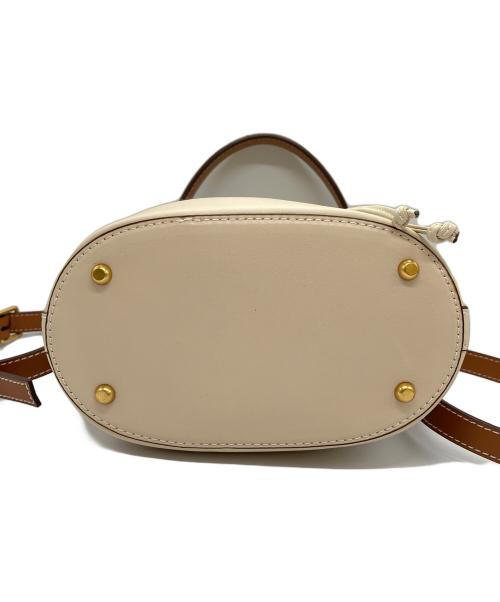 TORY BURCH（トリーバーチ）TORY BURCH (トリーバーチ) T MONOGRAM JACQUARD BUCKET BAG ベージュの古着・服飾アイテム