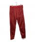STONE ISLAND（ストーンアイランド）の古着「NYLON METAL RIPSTOP PANTS」｜レッド