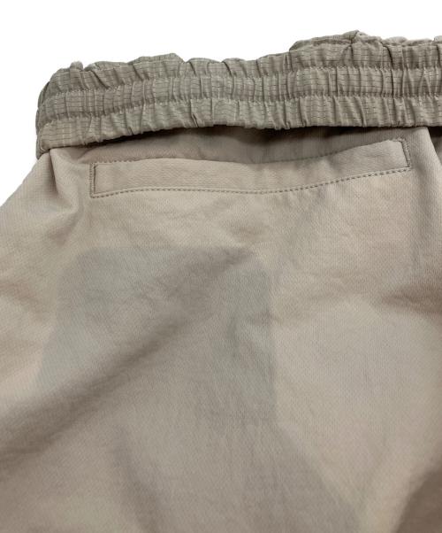 nanamica（ナナミカ）nanamica (ナナミカ) ALPHADRY WIDE EASY PANT ベージュ サイズ:30の古着・服飾アイテム