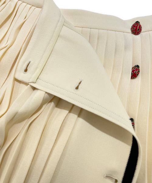 GUCCI（グッチ）GUCCI (グッチ) Pleated Skirt Ladybug Long Ivory/プリーツラップスカート てんとう虫 /523510 ZLW01 アイボリー サイズ:44の古着・服飾アイテム