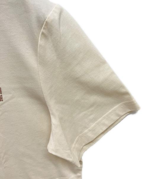 TORY BURCH（トリーバーチ）TORY BURCH (トリーバーチ) ラインストーンロゴTシャツ アイボリー サイズ:Sの古着・服飾アイテム