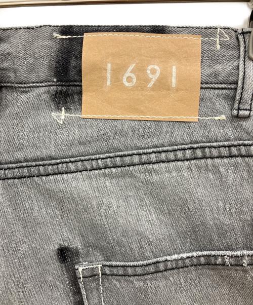 1691（イチロクキューイチ）1691 (イチロクキューイチ) ASYMMETRICAL STRAIGHT DENIM ブラック サイズ:2の古着・服飾アイテム