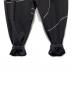 中古・古着 F.C.R.B. (エフシーレアルブリストル) PDK REFLECT LINE BAGGY PANTS ブラック サイズ:M：17000円