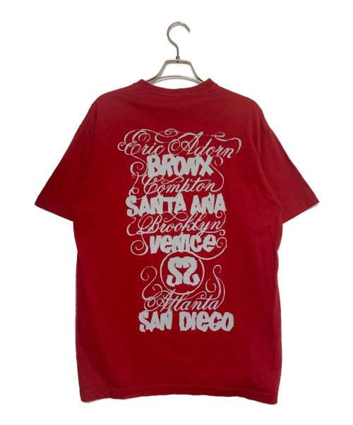 stussy（ステューシー）stussy (ステューシー) ワールドツアー プリントTシャツ レッド サイズ:Lの古着・服飾アイテム