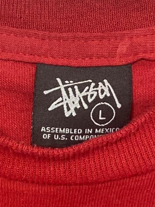 stussy（ステューシー）stussy (ステューシー) ワールドツアー プリントTシャツ レッド サイズ:Lの古着・服飾アイテム