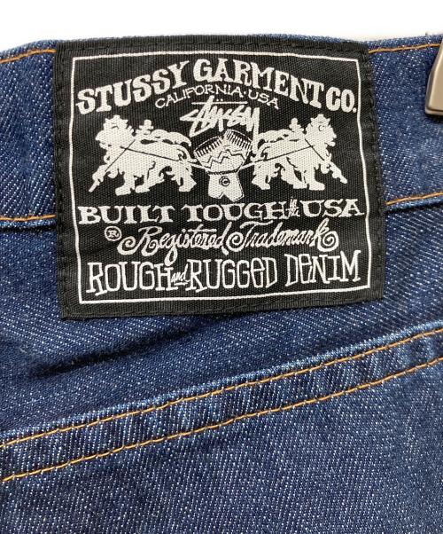 stussy（ステューシー）stussy (ステューシー) ROUGH AND RUGGED (ラフアンドラゲッド) ボタンフライデニムパンツ インディゴ サイズ:34の古着・服飾アイテム
