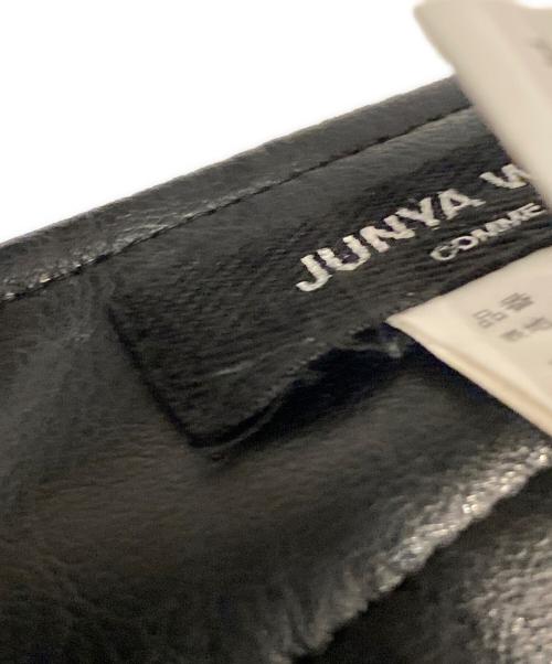 JUNYA WATANABE COMME des GARCONS（(ジュンヤワタナベ コムデギャルソン）JUNYA WATANABE COMME des GARCONS ((ジュンヤワタナベ コムデギャルソン) フェイクレザーラップスカート ブラック サイズ:Mの古着・服飾アイテム