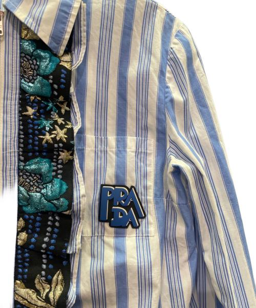 PRADA（プラダ）PRADA (プラダ) ストライプデザインフリルシャツ ブルー×ホワイト サイズ:42の古着・服飾アイテム