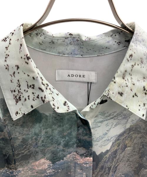 ADORE（アドーア）ADORE (アドーア) ランドスケーププリントブラウス ブルー サイズ:38 未使用品の古着・服飾アイテム