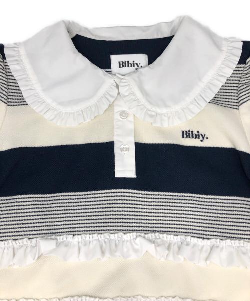 Bibiy.（ビビィ）Bibiy. (ビビィ) JAMIE FRILL TOP アイボリー×ネイビー サイズ:FREE 未使用品の古着・服飾アイテム