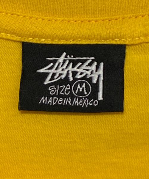 stussy（ステューシー）stussy (ステューシー) ダイスロゴTシャツ イエロー サイズ:Mの古着・服飾アイテム