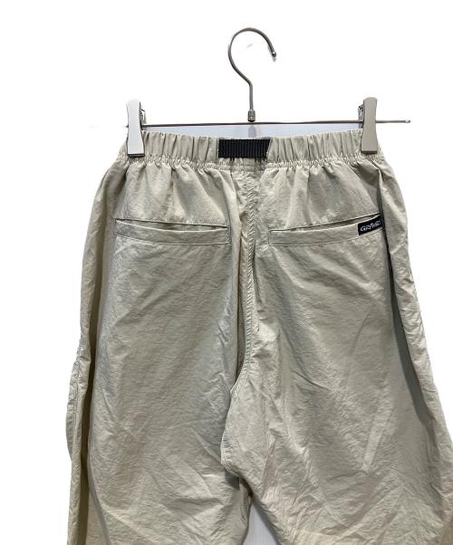 GRAMICCI（グラミチ）GRAMICCI (グラミチ) LOWERCASE NYLON TRACK PANT ベージュ サイズ:XSの古着・服飾アイテム