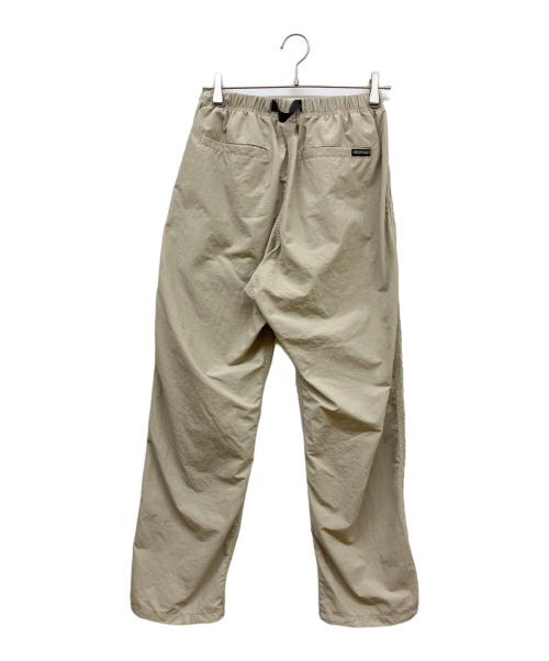 GRAMICCI（グラミチ）GRAMICCI (グラミチ) LOWERCASE NYLON TRACK PANT ベージュ サイズ:SIZE Mの古着・服飾アイテム