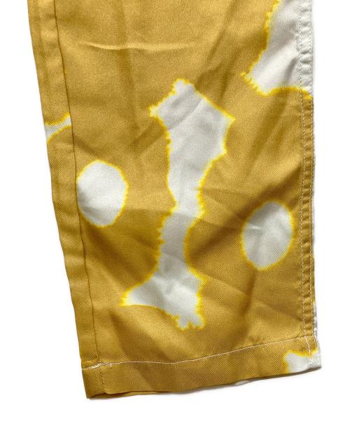 BANANATIME（バナナタイム）BANANATIME (バナナタイム) 総柄テーパードパンツ オレンジ×ホワイト サイズ:Sの古着・服飾アイテム
