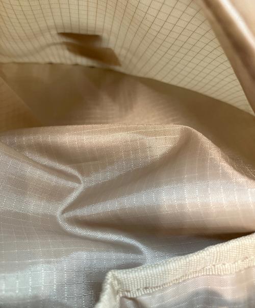 emmi atelier（エミアトリエ）emmi atelier (エミアトリエ) パッカブルバックパック ベージュの古着・服飾アイテム