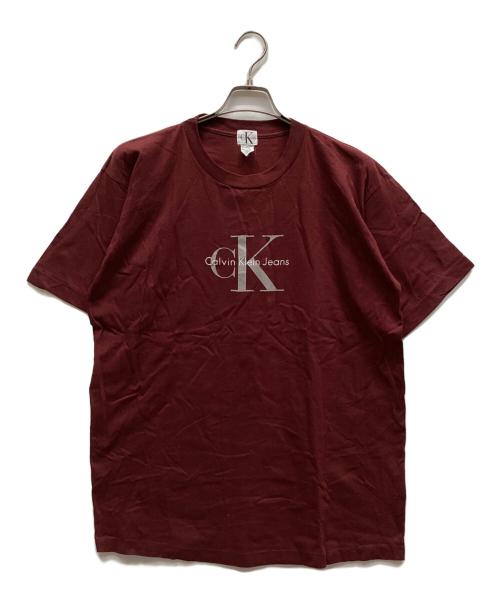 Calvin Klein Jeans（カルバンクラインジーンズ）Calvin Klein Jeans (カルバンクラインジーンズ) ロゴTシャツ ボルドー サイズ:XLの古着・服飾アイテム