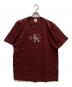 Calvin Klein Jeans（カルバンクラインジーンズ）の古着「ロゴTシャツ」｜ボルドー