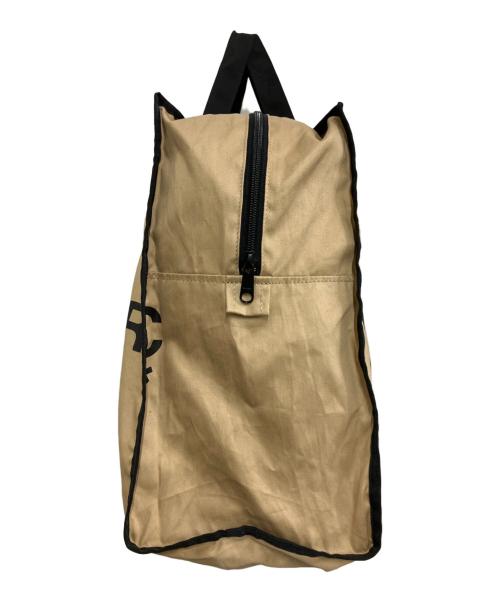 COMME des GARCONS（コムデギャルソン）COMME des GARCONS (コムデギャルソン) ロゴプリント ホリデーシーズン メッセージバッグ ベージュの古着・服飾アイテム