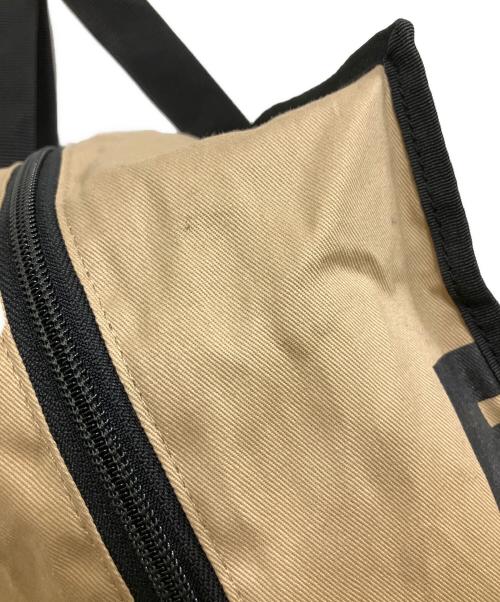 COMME des GARCONS（コムデギャルソン）COMME des GARCONS (コムデギャルソン) ロゴプリント ホリデーシーズン メッセージバッグ ベージュの古着・服飾アイテム