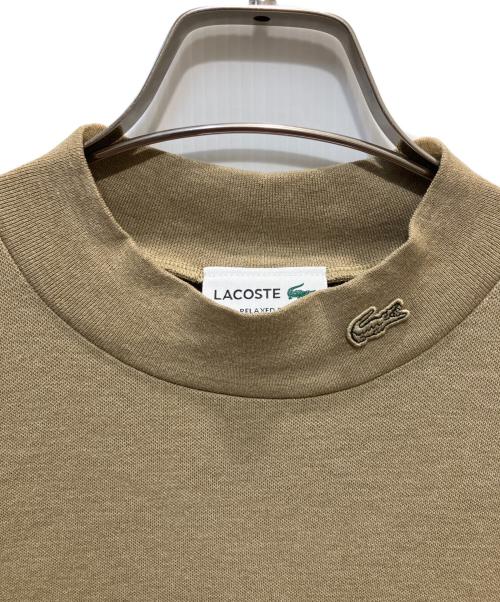 LACOSTE（ラコステ）LACOSTE (ラコステ) 5分袖 モックネック サマーニットTシャツ ベージュ サイズ:XSの古着・服飾アイテム